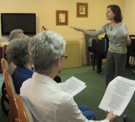 Our resident chorus (The Meadowlarks) practice in the living room